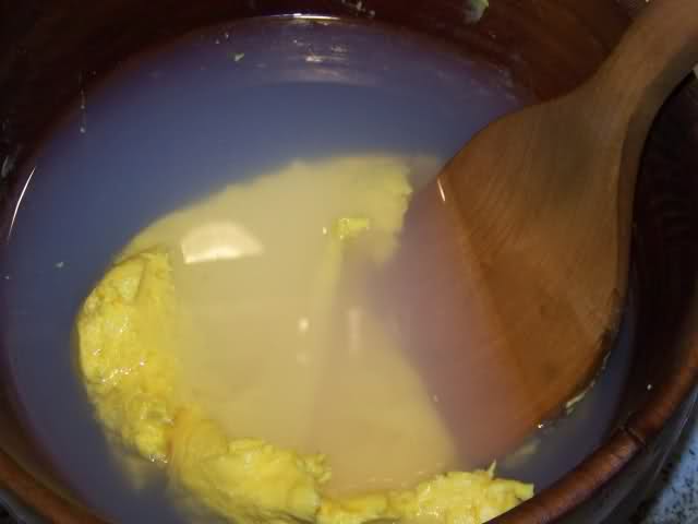Cleaning butter by removing buttermilk